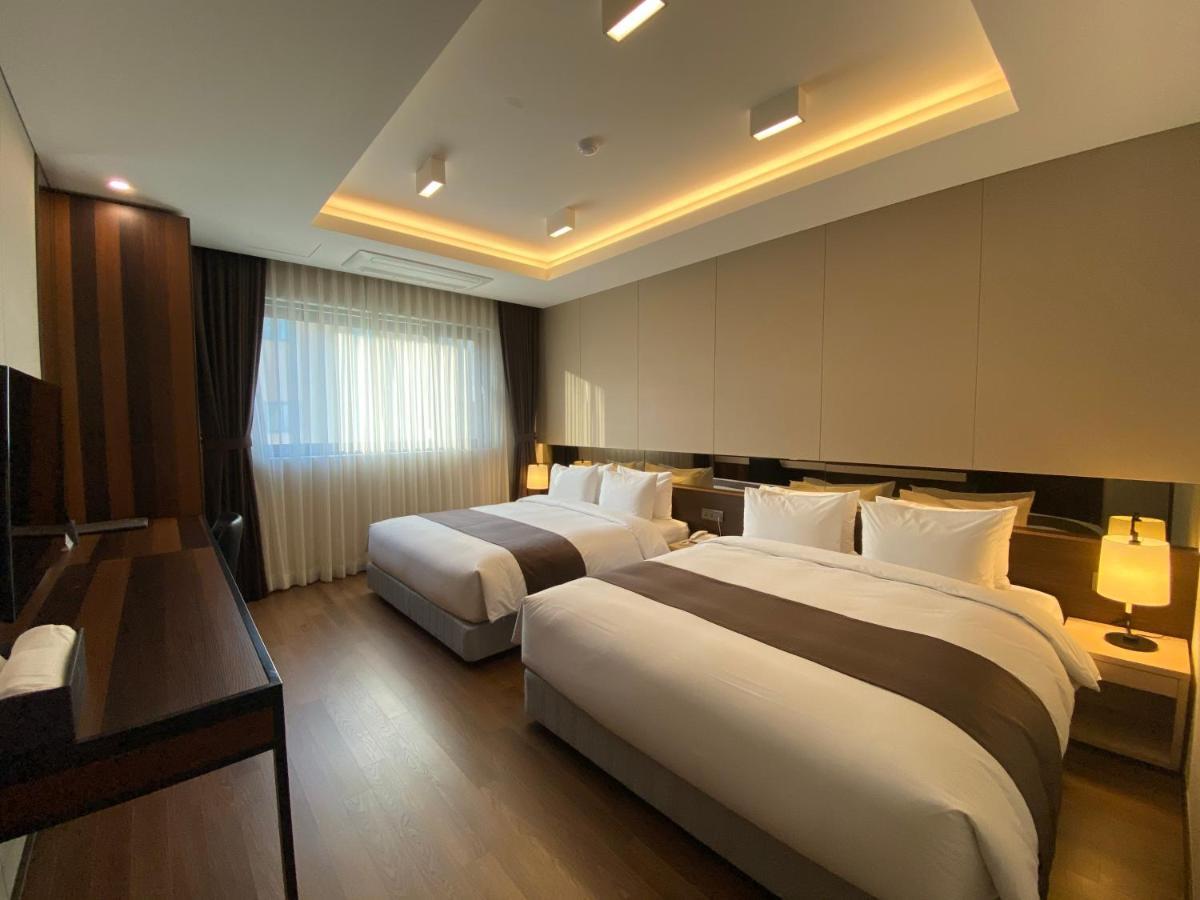 New Donghae Tourist Hotel Quarto foto