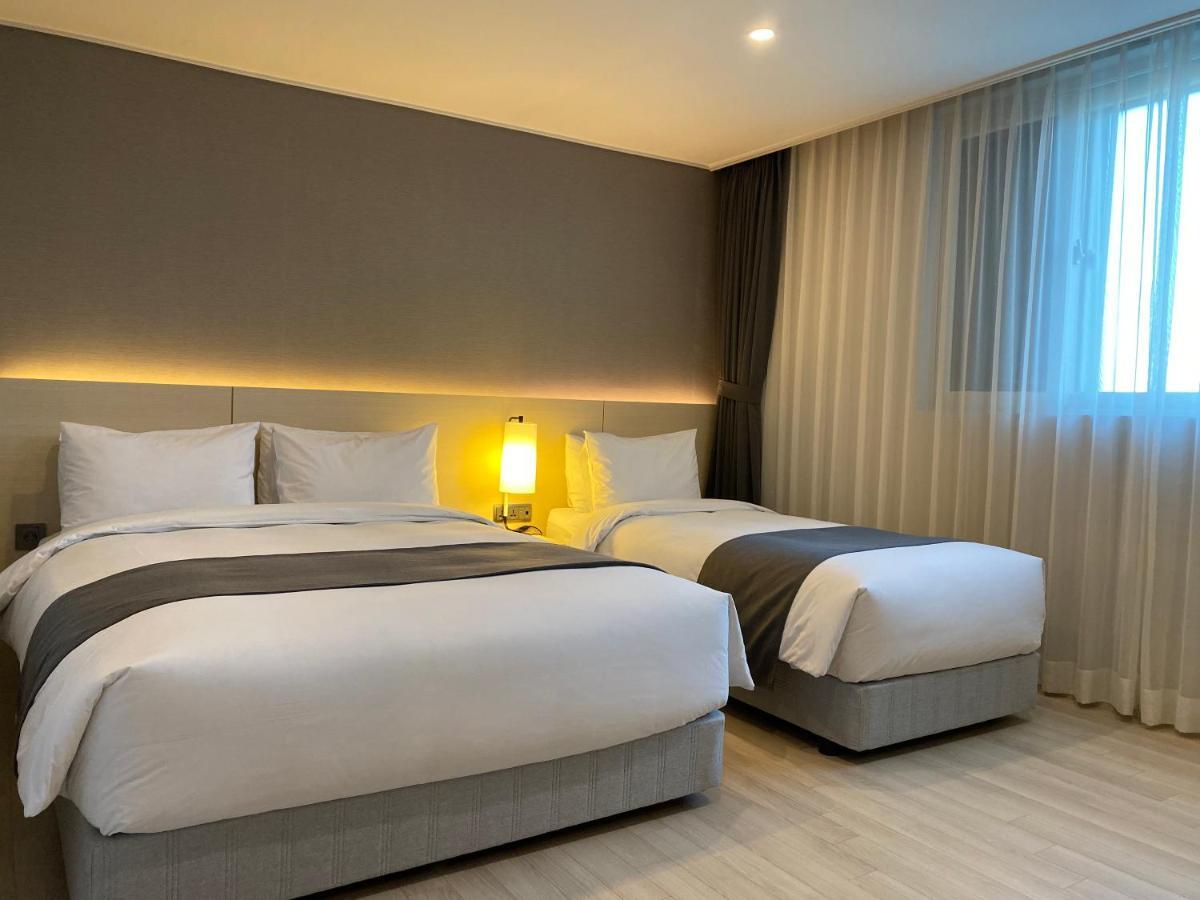 New Donghae Tourist Hotel Quarto foto